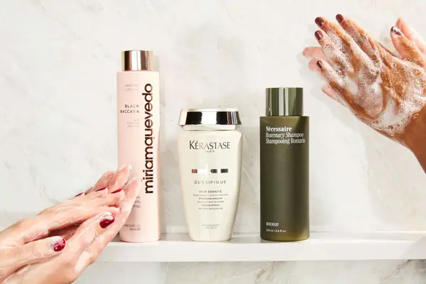hands lathering up to use the best shampoos for hair growth